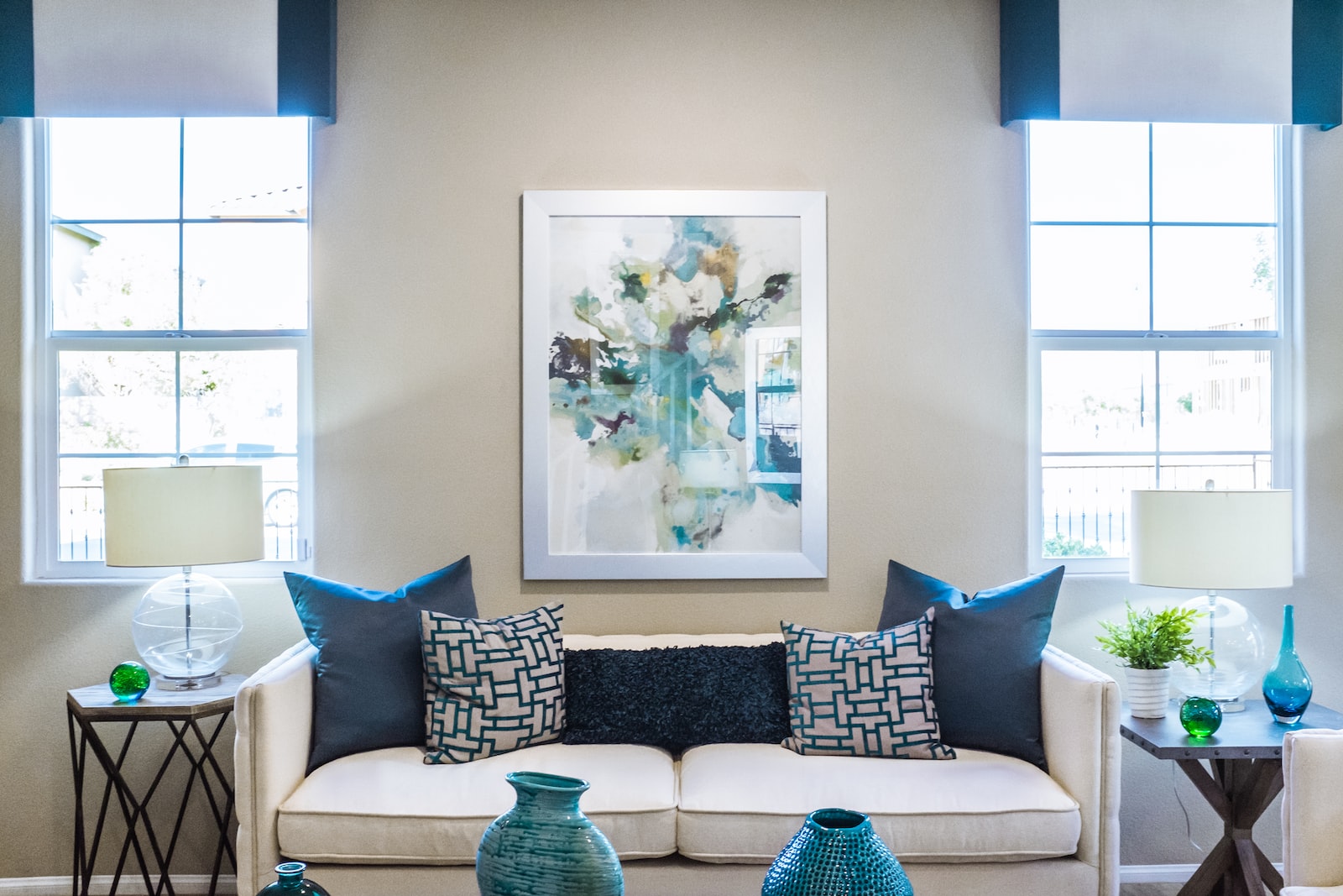 Photo by Kenny Eliason couch near painting